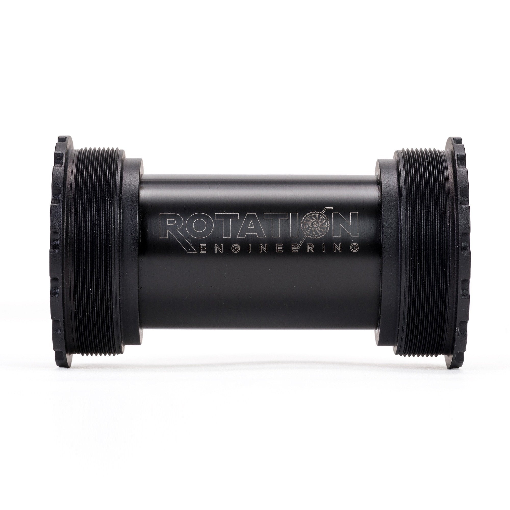 Close-up of a black cylindrical mechanical part, labeled "Rotation Engineering." It has threaded ends, a smooth surface, and exudes a sleek, industrial look.